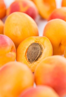 Portion of fresh Apricots (close-up shot, selective focus)