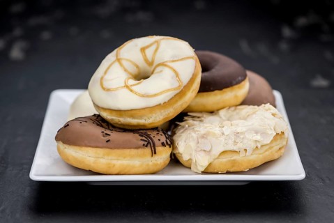 Fresh made Donuts as detailed close-up shots (selective focus)