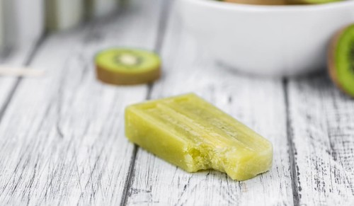 Kiwi Popsicles (fresh) as detailed close-up shot, selective focus)