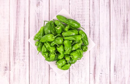 Portion of fresh Raw Pimientos close-up shot, selective focus
