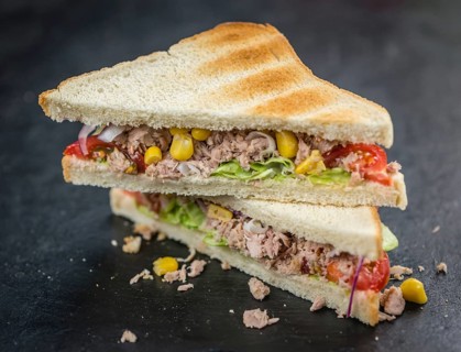 Tuna Sandwich (selective focus, close-up shot) on vintage background