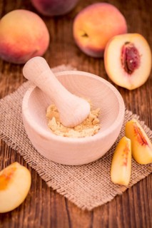 Portion of fresh Ground Peaches close-up shot, selective focus