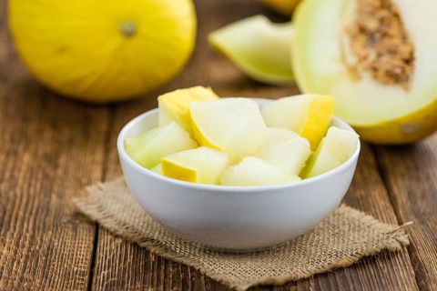 Portion of fresh made Honeydew Melon (close-up shot, selective focus)