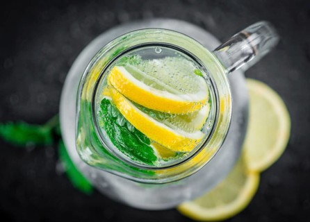 Some Lemonade (with Balm) on a slate slab (close-up shot, selective focus)