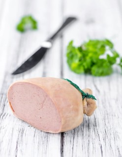 Portion of fresh made Liverwurst (close-up shot, selective focus)