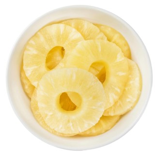 Fresh made Preserved Pineapple Rings isolated on white background, close-up shot