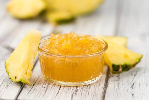 Some homemade Pineapple Jam as detailed close-up shot, selective focus