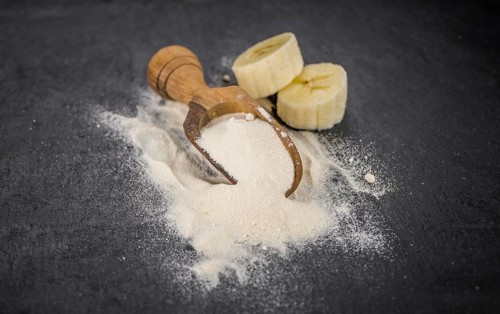 Portion of fresh Banana Powder close-up shot, selective focus