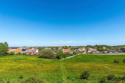 Bagenkop Klinten, Dovne Kliff, view from the cliff over the town, flowering meadow, Langeland
