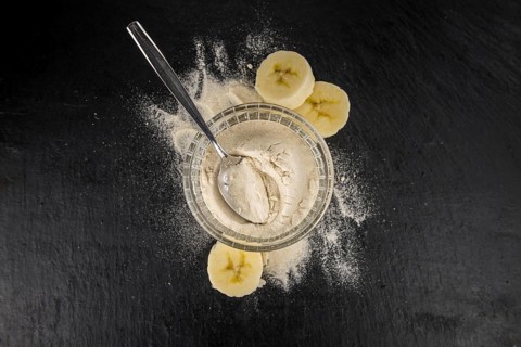 Portion of fresh Banana Powder close-up shot, selective focus