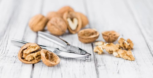 Portion of fresh Walnuts (close-up shot, selective focus)