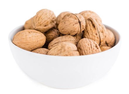 Walnuts isolated on white background (selective focus, close-up shot)