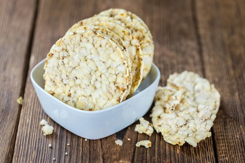 Some fresh made Corn Waffles on wooden background (selective focus)
