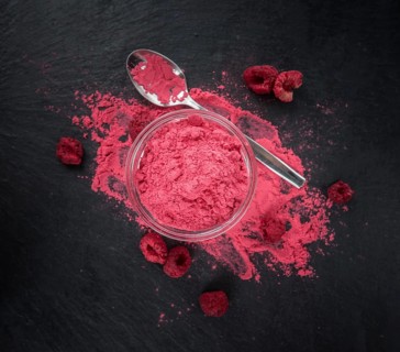 Homemade Ground Raspberries on vintage background selective focus, close-up shot