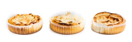 Fresh made Mini Cheesecake isolated on white background (close-up shot)