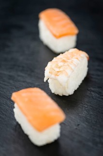 Some fresh made Sushi (detailed close-up shot, selective focus)