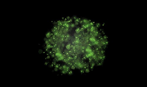 A cluster of glowing green particles forming a hexagon pattern on a dark background, background