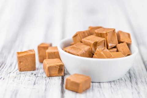 Portion of fresh Caramel (close-up shot, selective focus)