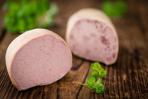 Portion of fresh made Liverwurst (close-up shot, selective focus)