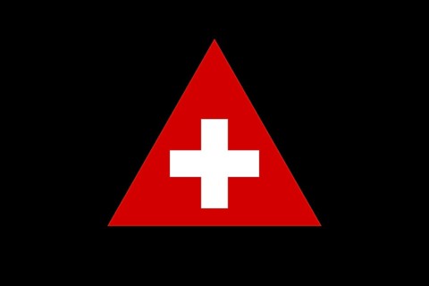 Red Triangle Shape Swiss Flag with White Cross Shape on Black Background in Switzerland