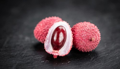 Portion of fresh Lychees (close-up shot, selective focus)