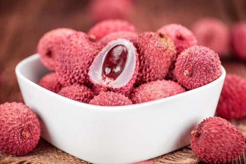 Portion of fresh Lychees (close-up shot, selective focus)