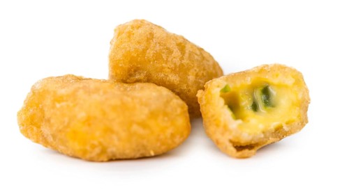 Portion of Chili Cheese Nuggets (as close-up shot) isolated on white background