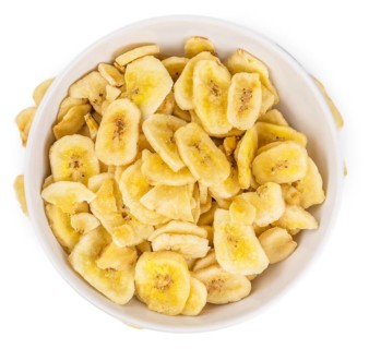 Fresh made Dried Banana Chips isolated on white background, close-up shot