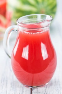Watermelon Smoothie on a vintage background as detailed close-up shot (selective focus)