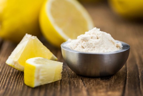 Portion of healthy Lemon powder (selective focus, close-up shot)