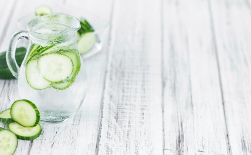Homemade Cucumber Water on vintage background selective focus, close-up shot