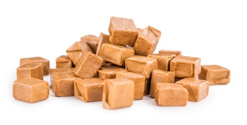 Portion of fresh made Caramel isolated on white background