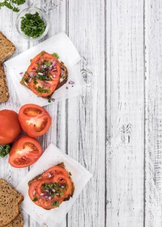 Portion of fresh Tomato Sandwich (selective focus, close-up shot)