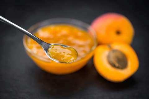 Some homemade Apricot Jam (selective focus) as detailed close-up shot