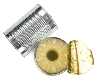 Portion of Preserved Pineapple Rings as detailed close-up shot isolated on white background
