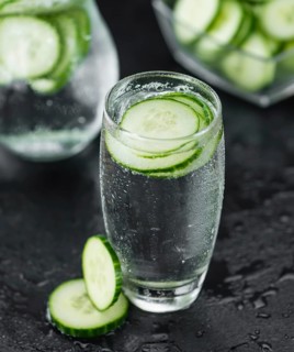 Some fresh Cucumber Water on a vintage slate slab, selective focus, close-up shot