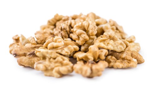Walnuts (kernels) isolated on white background (selective focus, close-up shot)