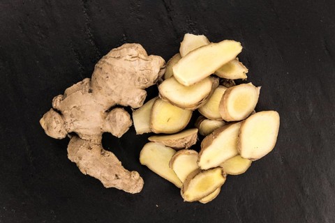 Some fresh Ginger Slices (selective focus, close-up shot)