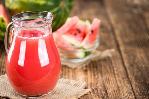 Watermelon Smoothie on a vintage background as detailed close-up shot (selective focus)