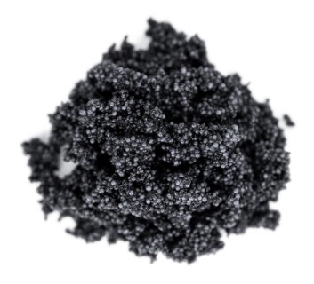 Black Caviar isolated on white background (selective focus, close-up shot)