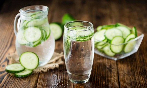 Homemade Cucumber Water on vintage background selective focus, close-up shot