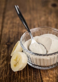 Portion of fresh Banana Powder close-up shot, selective focus