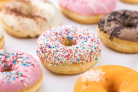 Portion of some Donuts as detailed close-up shot (fresh made, selective focus)