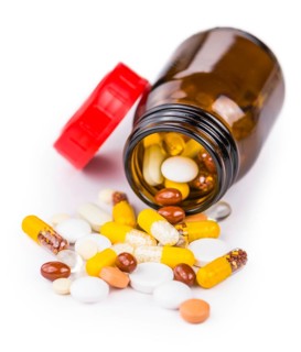 Mixed drugs isolated on white background as detailed close-up shot (selective focus)