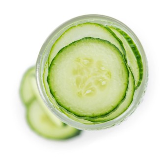 Portion of Cucumber Water as detailed close-up shot isolated on white background