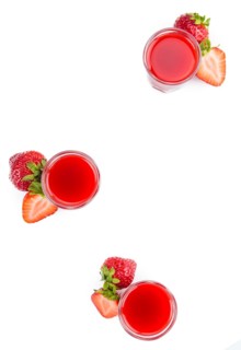 Fresh made Strawberry liqueur isolated on white background, close-up shot