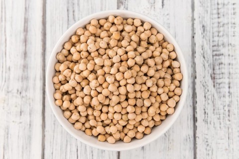 Portion of fresh Chickpeas close-up shot, selective focus