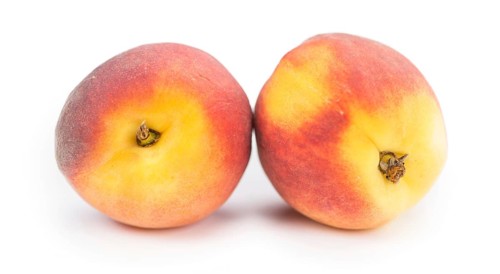 Peaches isolated on white background, selective focus, close-up shot