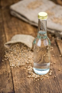 Portion of Wheat Liqueur as detailed close-up shot, selective focus