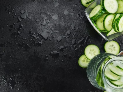 Cucumber Water on a vintage background as detailed close-up shot, selective focus